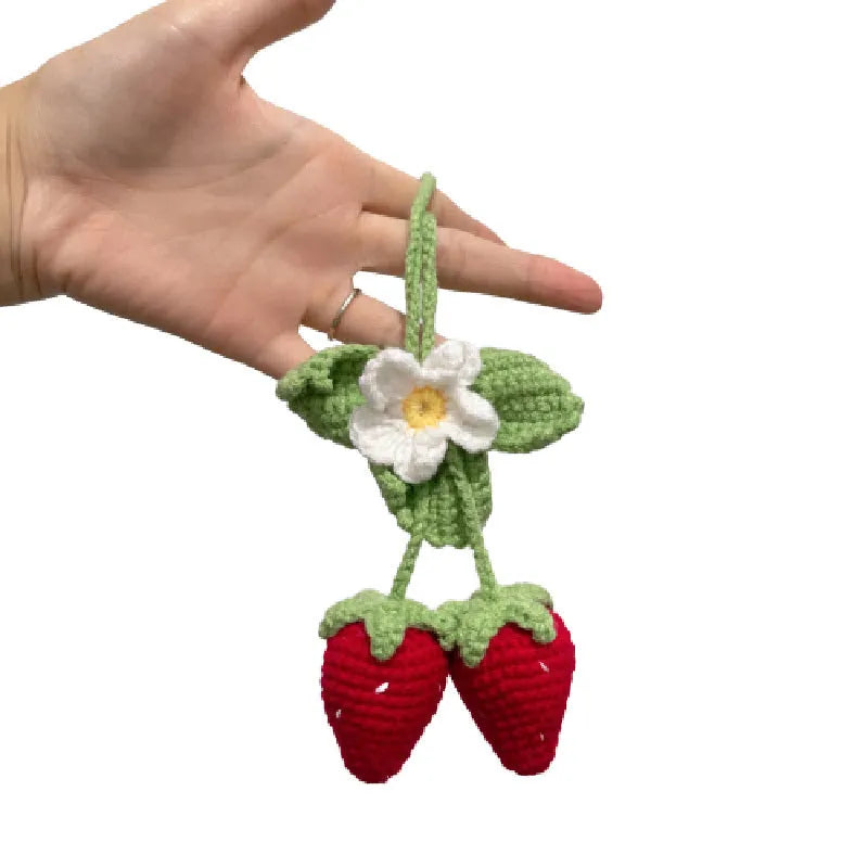 Handmade woven strawberry-shaped car pendant made from cotton and hemp knitting wool.