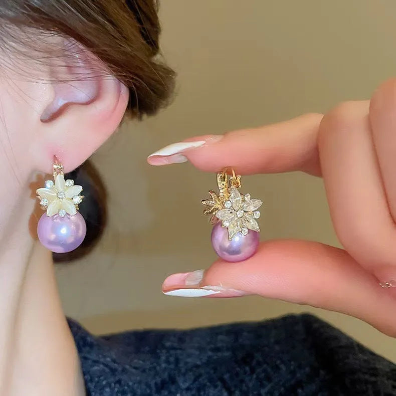 Purple pearl simple flower style fashion earrings on a white background, showing purple colour option