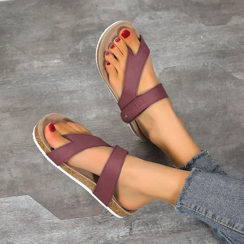 Flat thick-soled toe ring flip-flops in blue, showing artificial PU upper and foam sole.