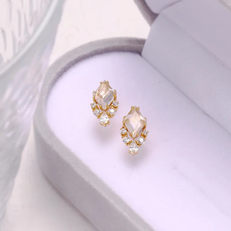 Geometric 925 sterling silver earrings with sweet white crystal accents on electroplated settings