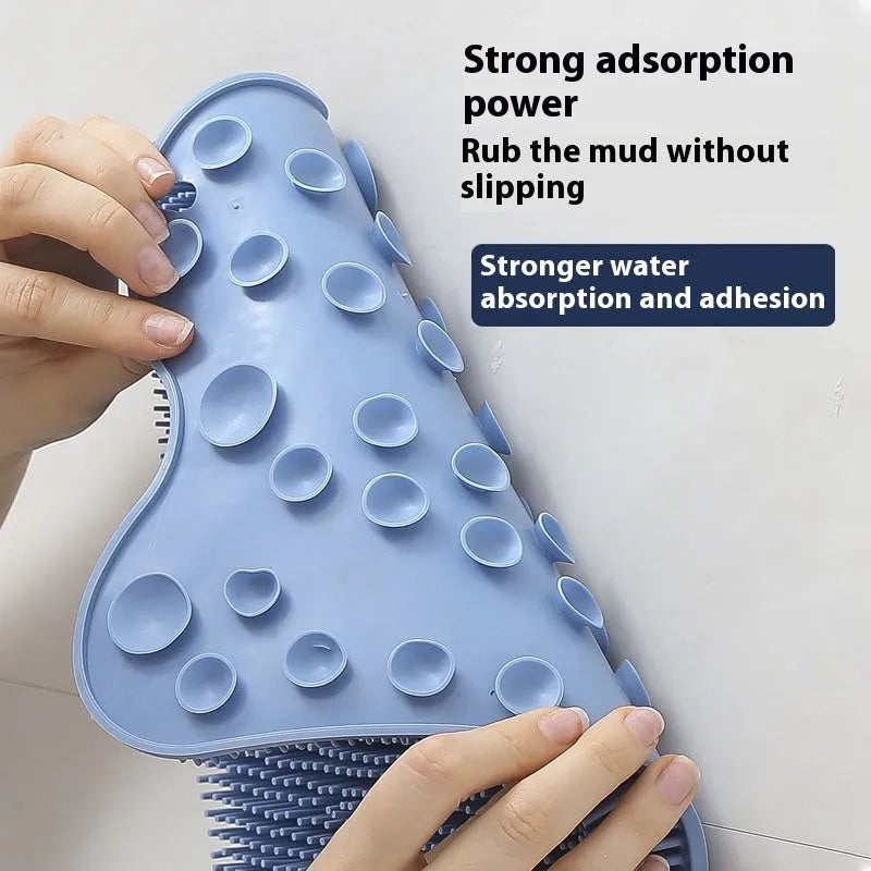 Blue silicone bath massage mat with textured surface for grip and skin stimulation