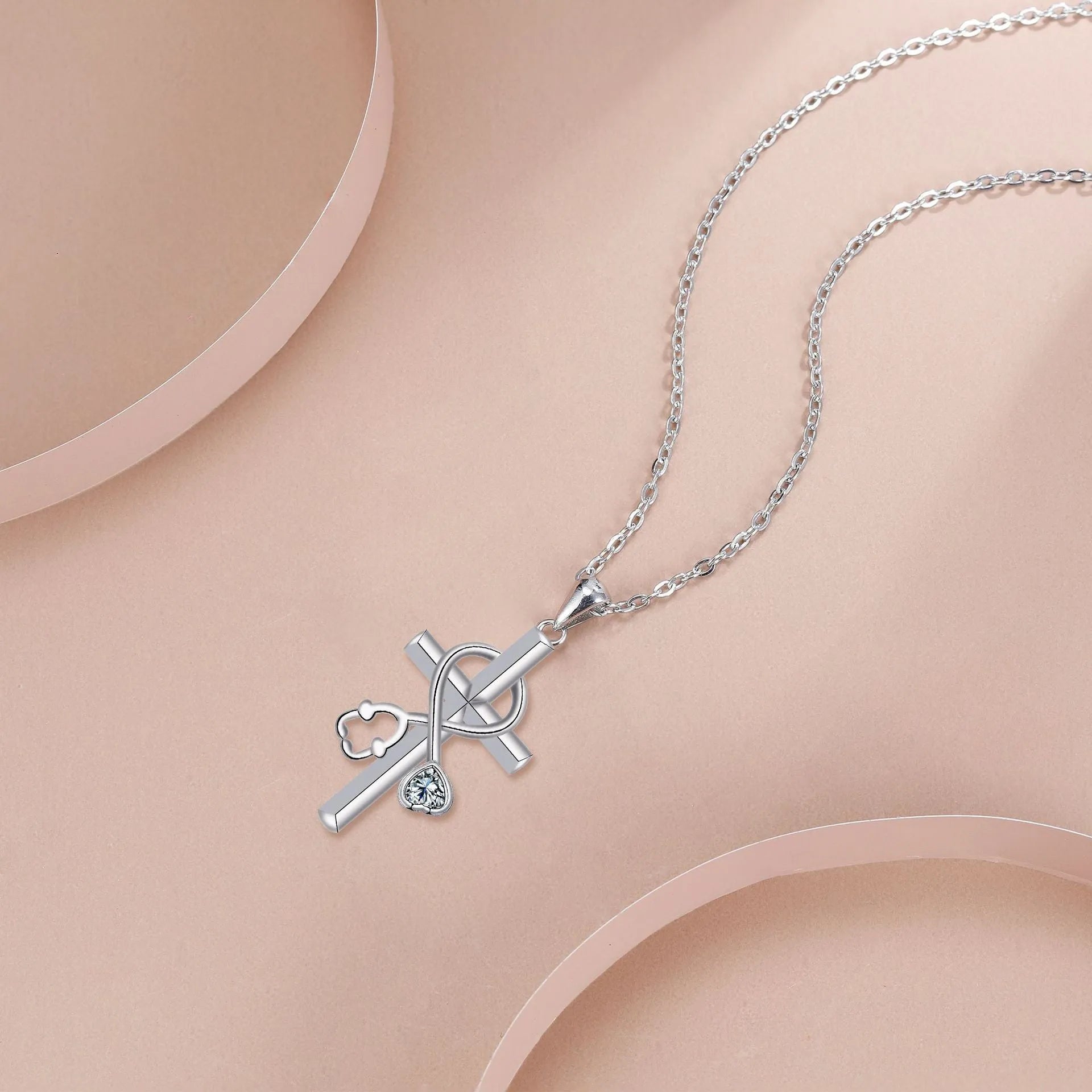Women's necklace with copper stethoscope pendant on cross chain, electroplated finish