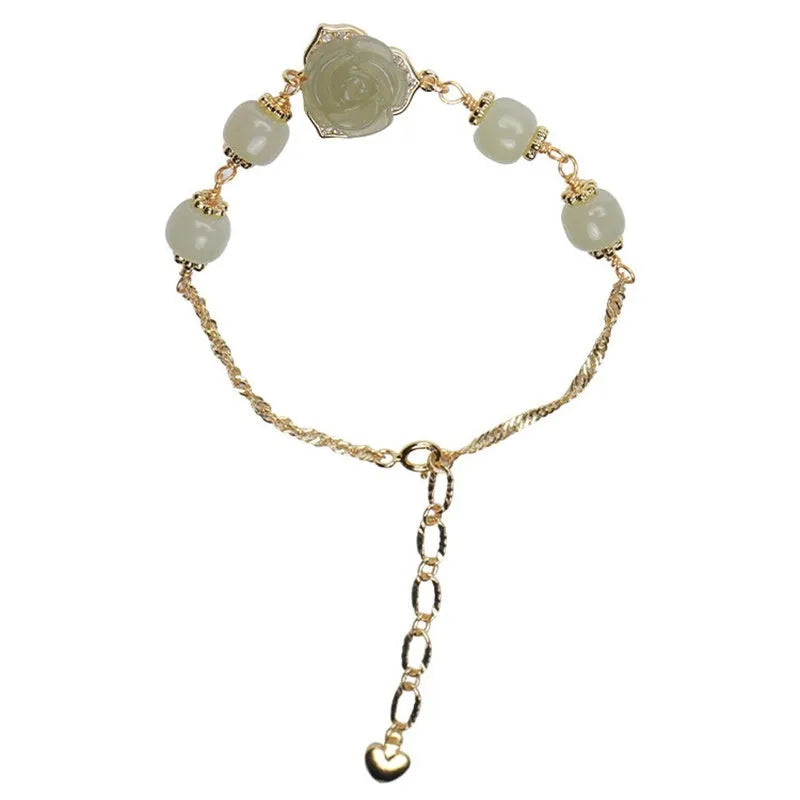 Women's jade bracelet with rose floral design and 14K gold gilding in Hetian Jade Rose colour.