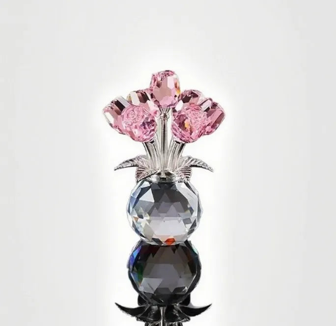 Geometric K9 crystal glass rose decorative craft in multiple colour options on a table.