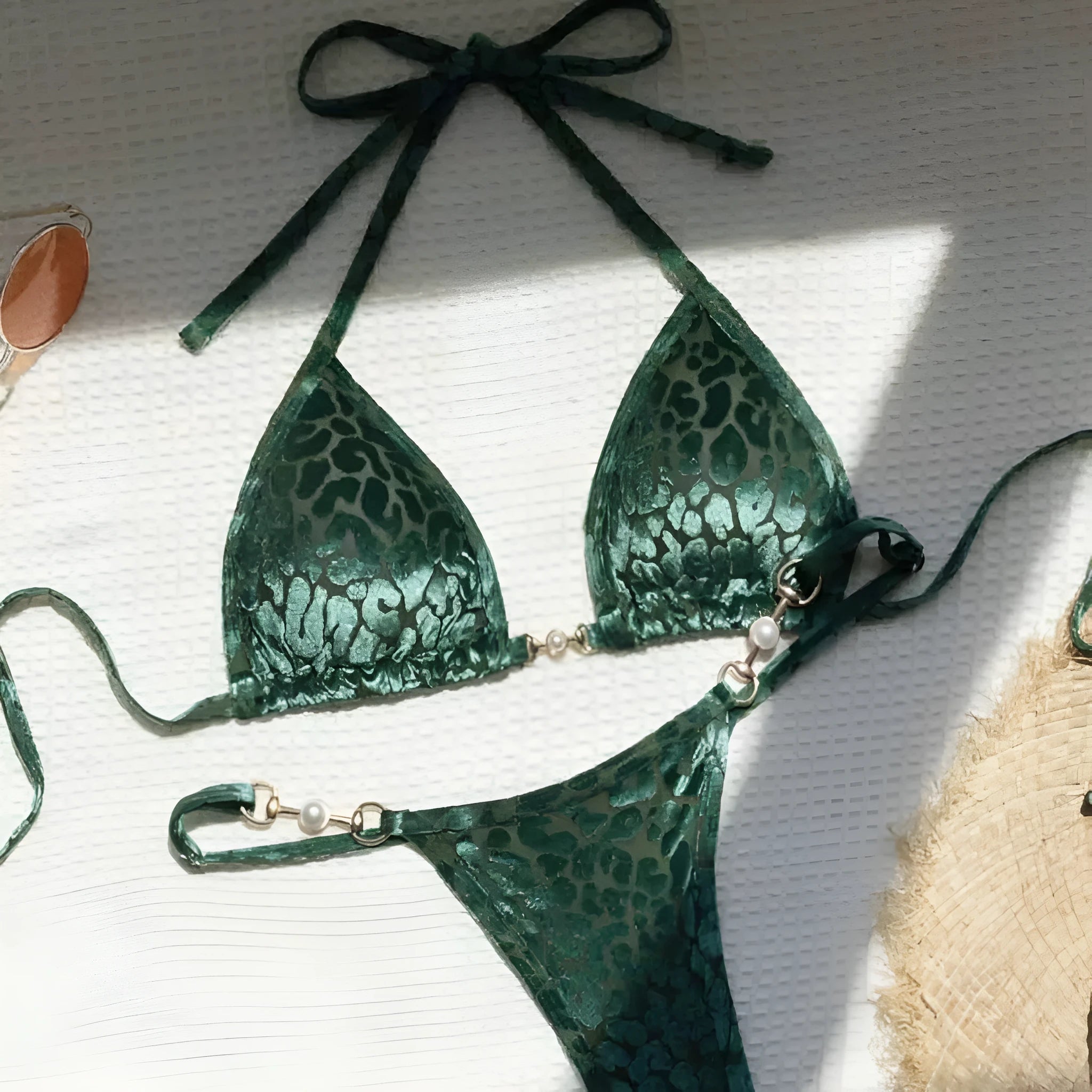Blue leopard print women's swimsuit bikini set on a mannequin.
