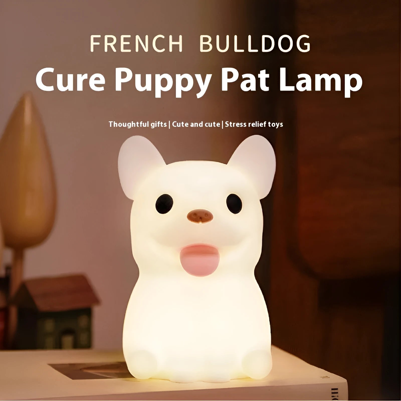 Silicone animal cartoon USB night light with Zodiac design on a bedside table.