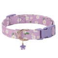 Adjustable dog collar with floral pattern in Strawberry colour on a white background