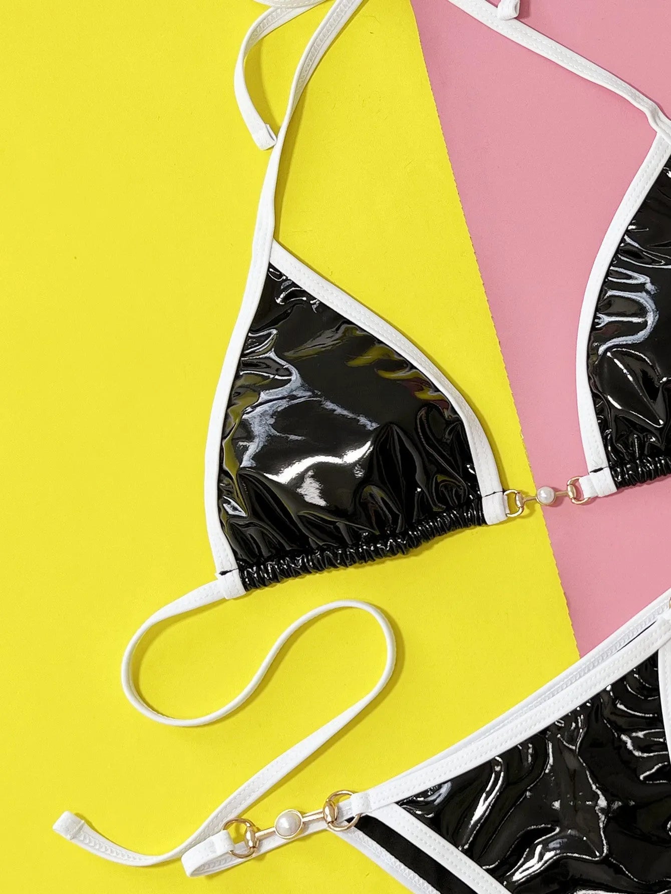 Black women's bikini swimsuit set with triangle top and split briefs