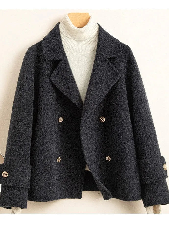 Women's solid colour polyester woolen coat in black with conventional sleeves, front view