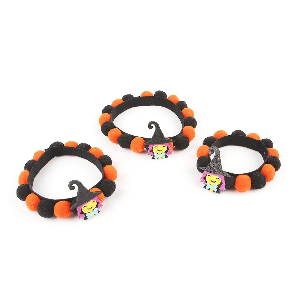 Halloween pet collar with fur ball decoration in pumpkin, pirate, skull, and witch colour designs