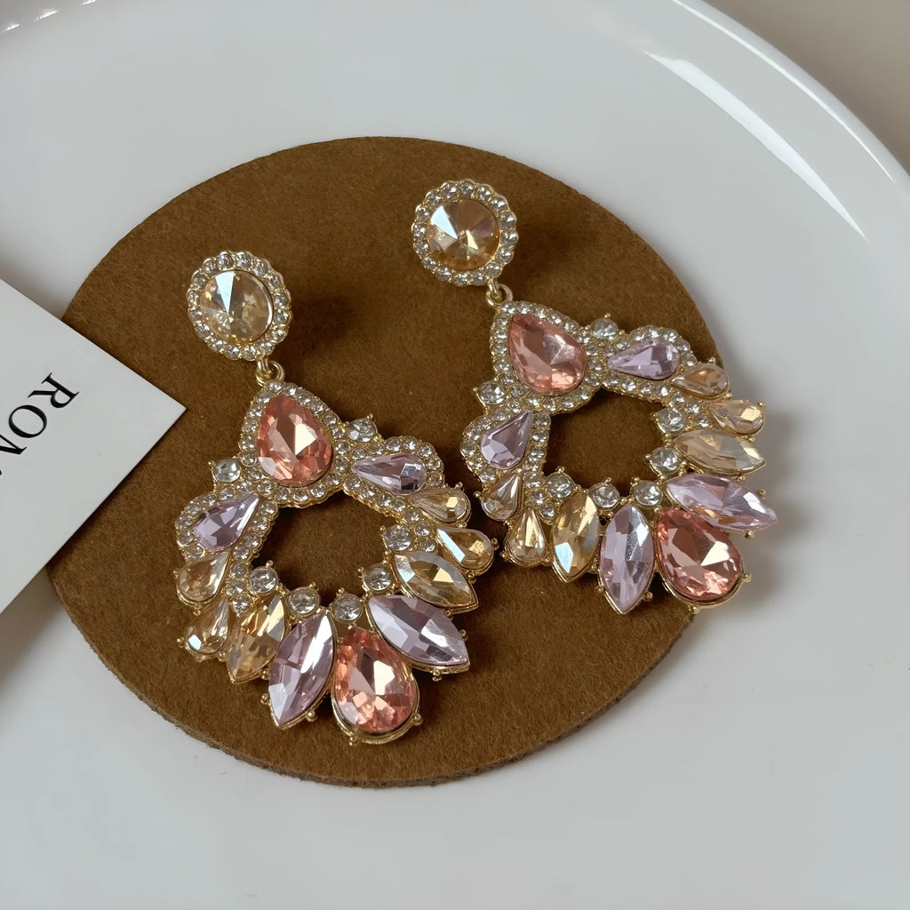 Pair of geometric rhinestone earrings with dot pattern on alloy base for women