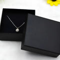 Set of four kraft paper jewellery boxes in imitated black with different sizes for storage