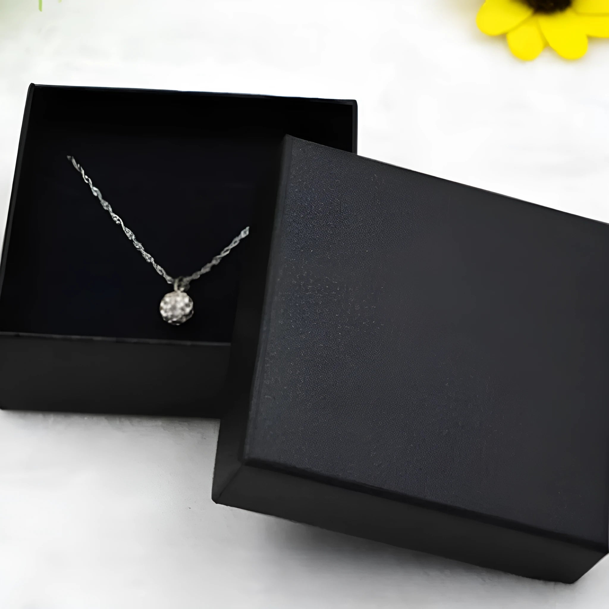 Set of four kraft paper jewellery boxes in imitated black with different sizes for storage