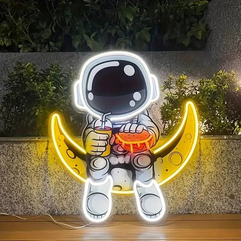 Astronaut-shaped wall-mounted neon light with USB power cord in blue or white colour options