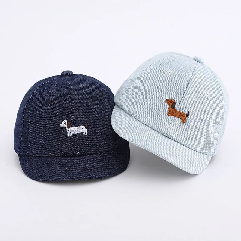 Denim puppy print baseball cap for babies with dome crown and short brim in black, dark blue, or light blue