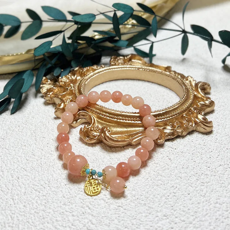 Pink natural stone charm bracelet with adjustable alloy chain for women