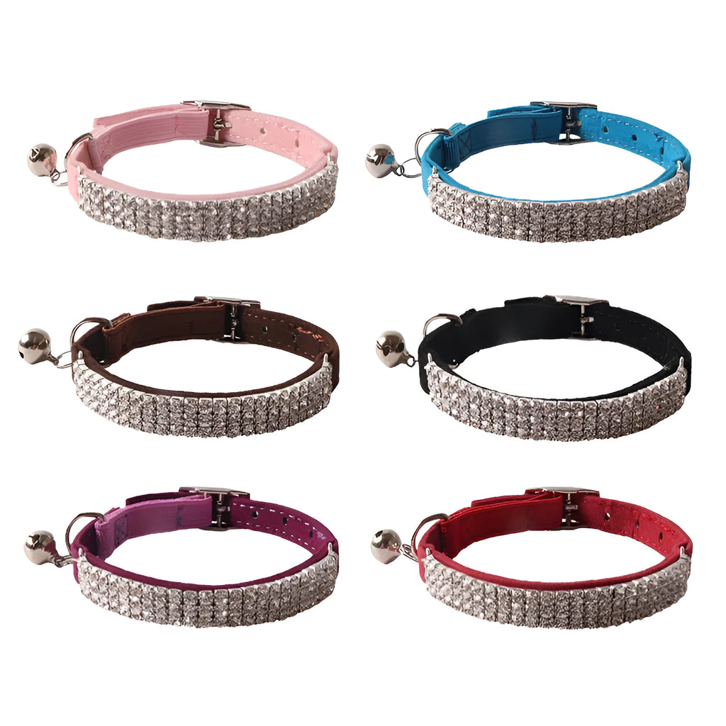Soft flocked cat collar with elastic buckle in multiple colours on a white background.