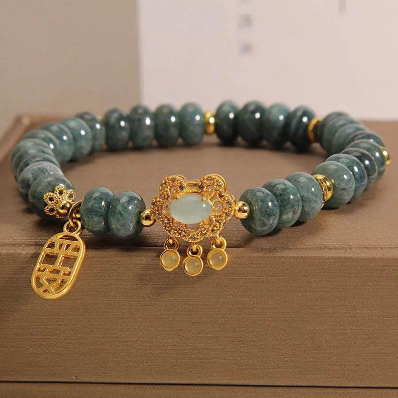 Women's natural emerald jade bracelet with abacus beads and safety lock closure