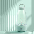 Automatic electric shaker bottle with USB charging port and handle in green, pink or white.