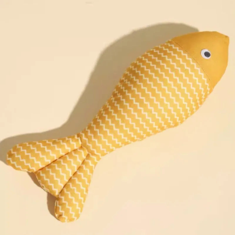 A blue, red, or yellow fabric fish-shaped cat toy filled with catnip, shown in large or medium sizes.