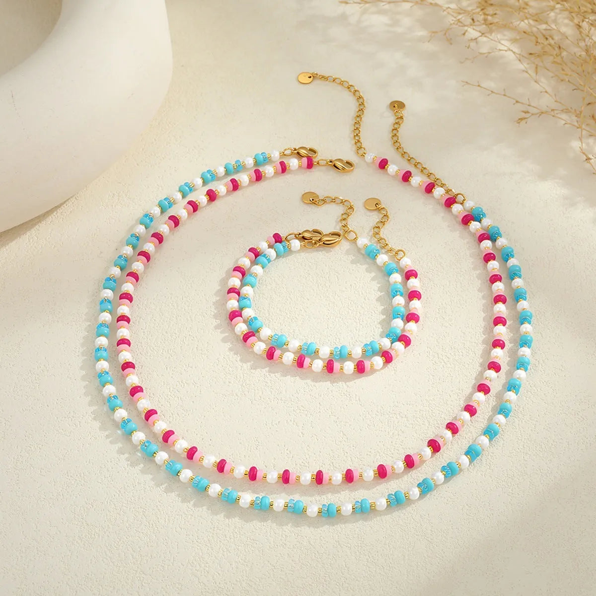 Sweet resin beaded necklace for women with geometric pendant, stainless steel chain, pink beads