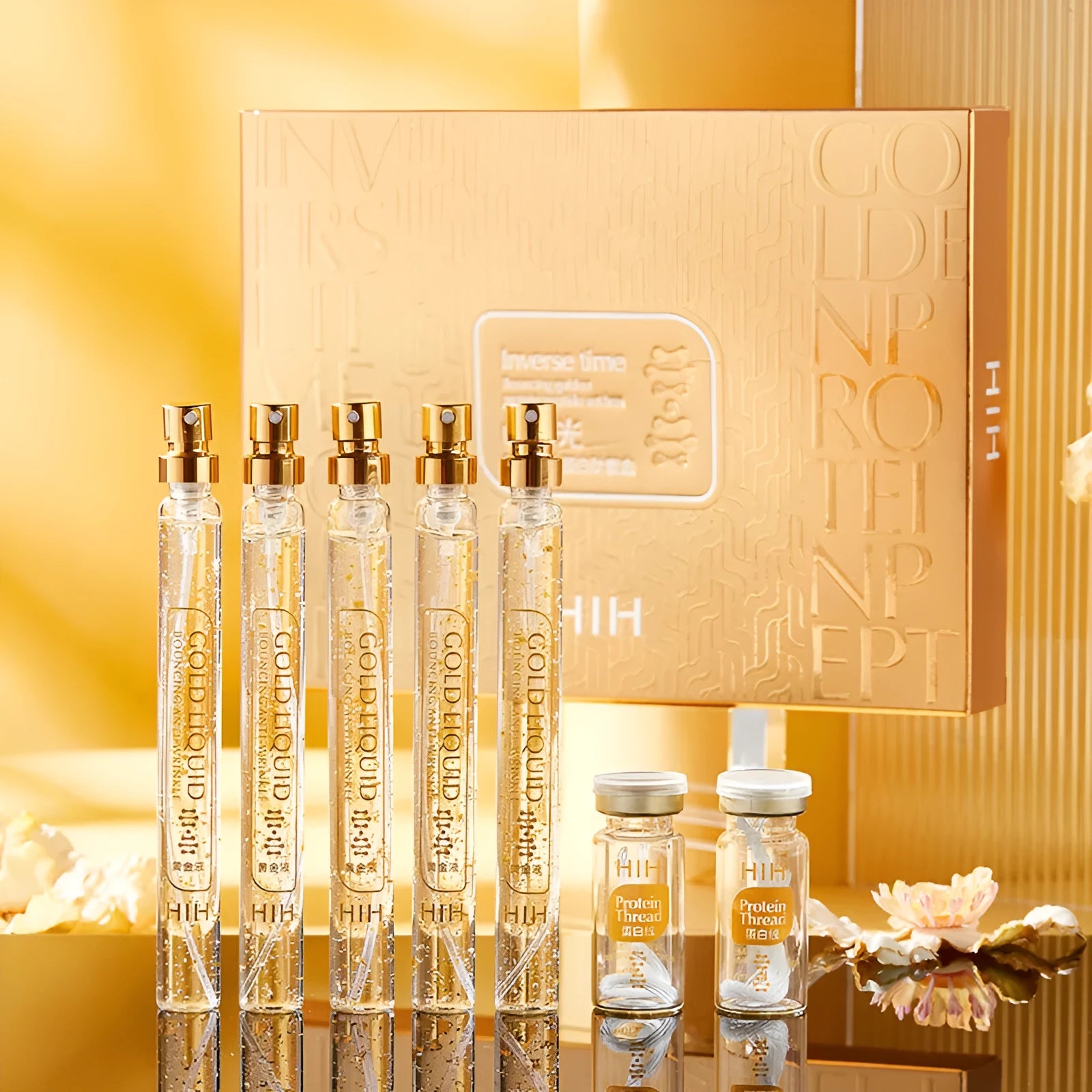 Gold Protein Peptide Kit with 15ml essence vials and 20-stick bottles on a white background