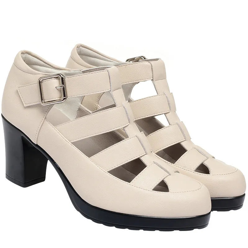 Women's beige closed toe sandals with chunky heel, woven ankle-strap buckle, and back zipper on a plain background