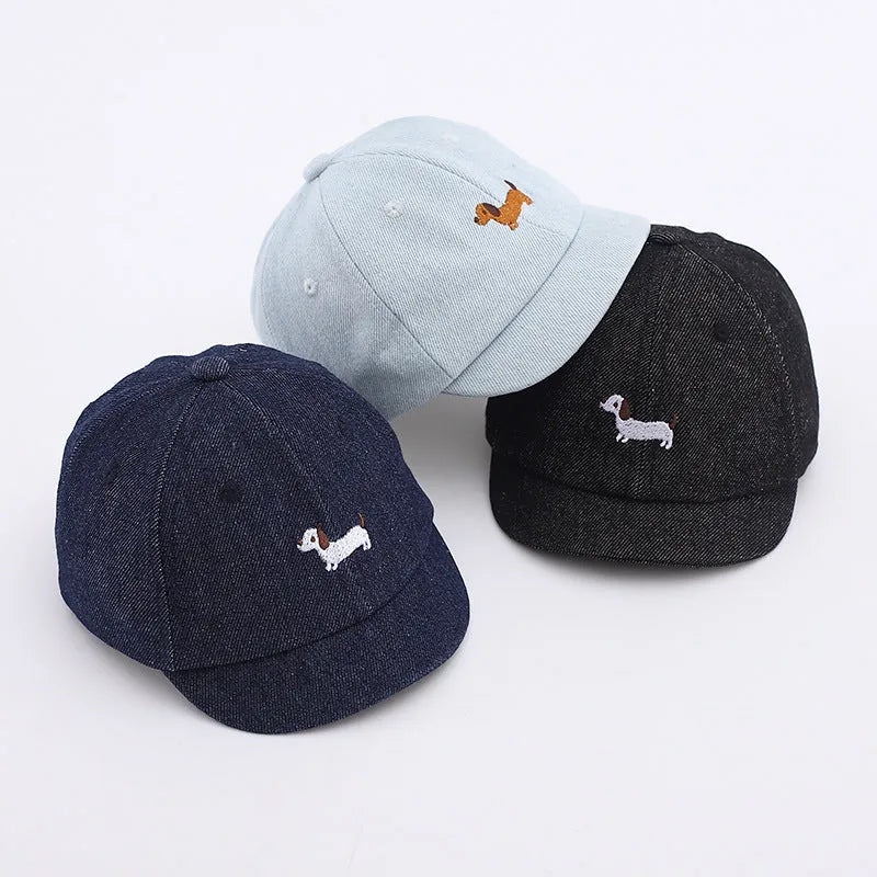 Denim puppy print baseball cap for babies with dome crown and short brim in black, dark blue, or light blue