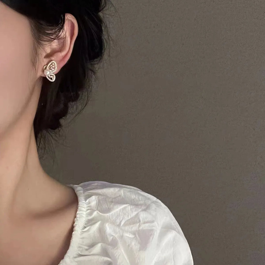 Copper butterfly pearl stud earrings with gold plating and zircon for women