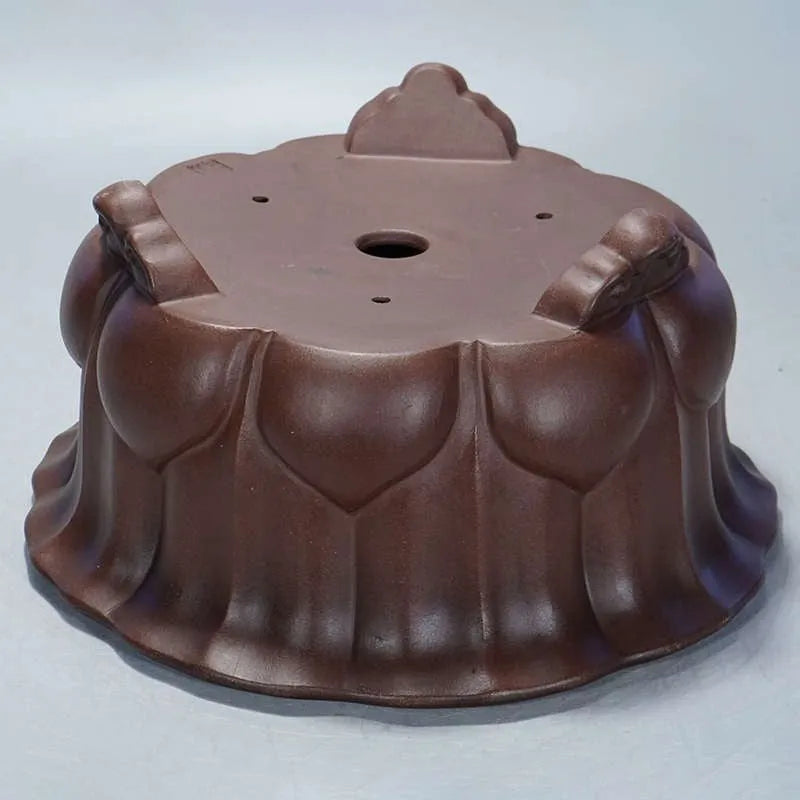 Square purple-red antique Petal Basin flowerpot for bonsai plants on a surface.
