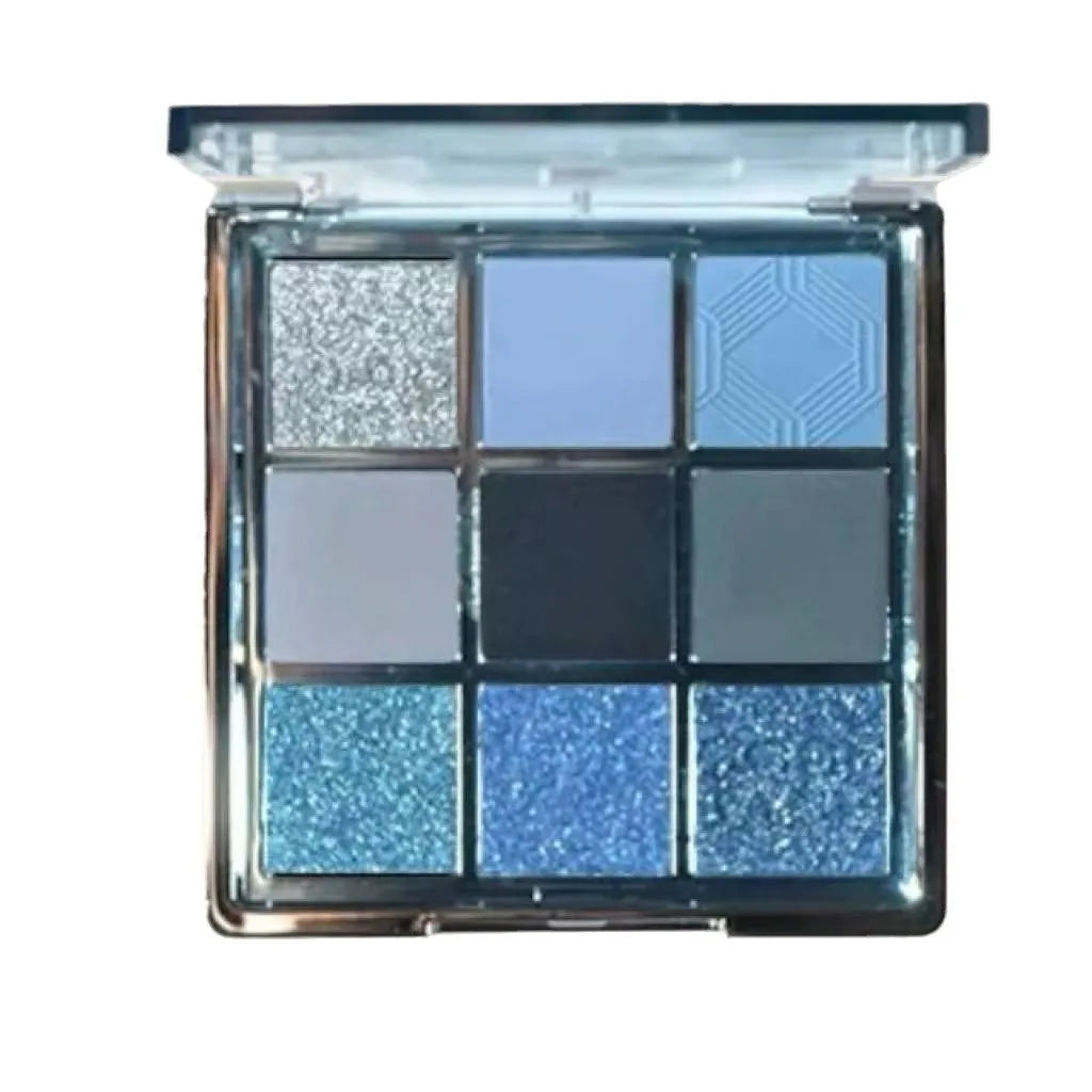 MUGELEEN nine-colour eyeshadow palette showing low saturation blue and earth tones with diamond debris effect
