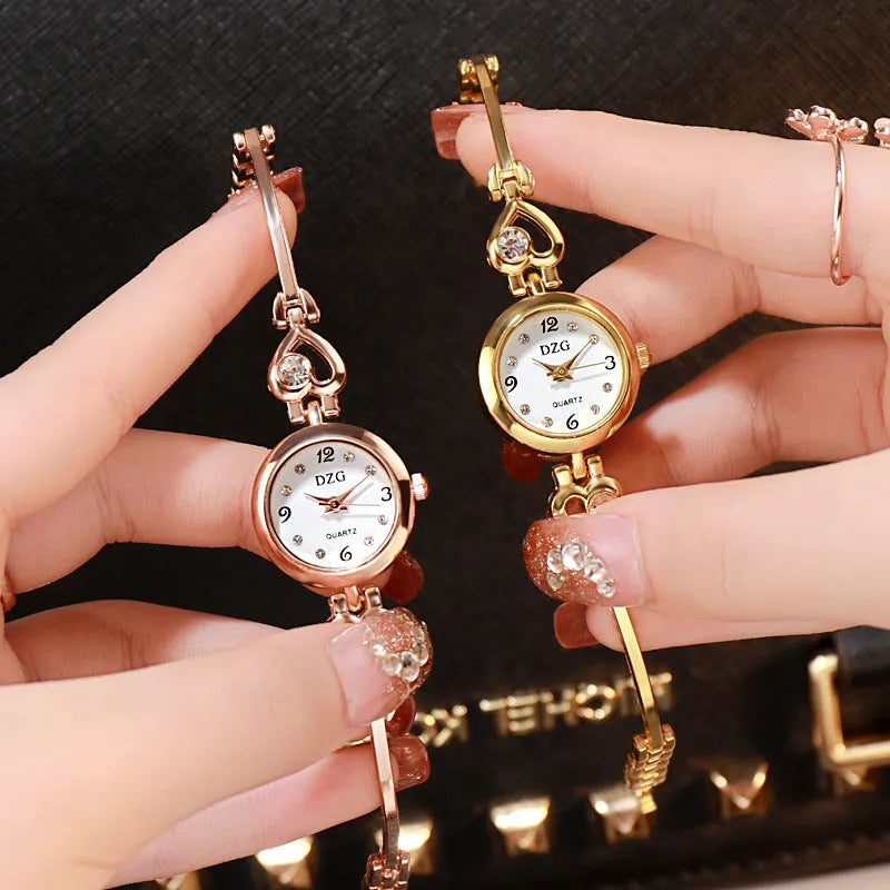 Women's simple rhinestone casual square watch with gold alloy strap and stainless steel buckle on white background
