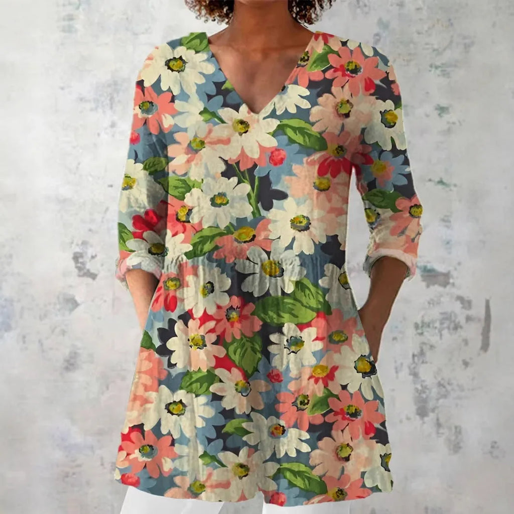 Women's retro patterned long-sleeved top with V-neck on a hanger