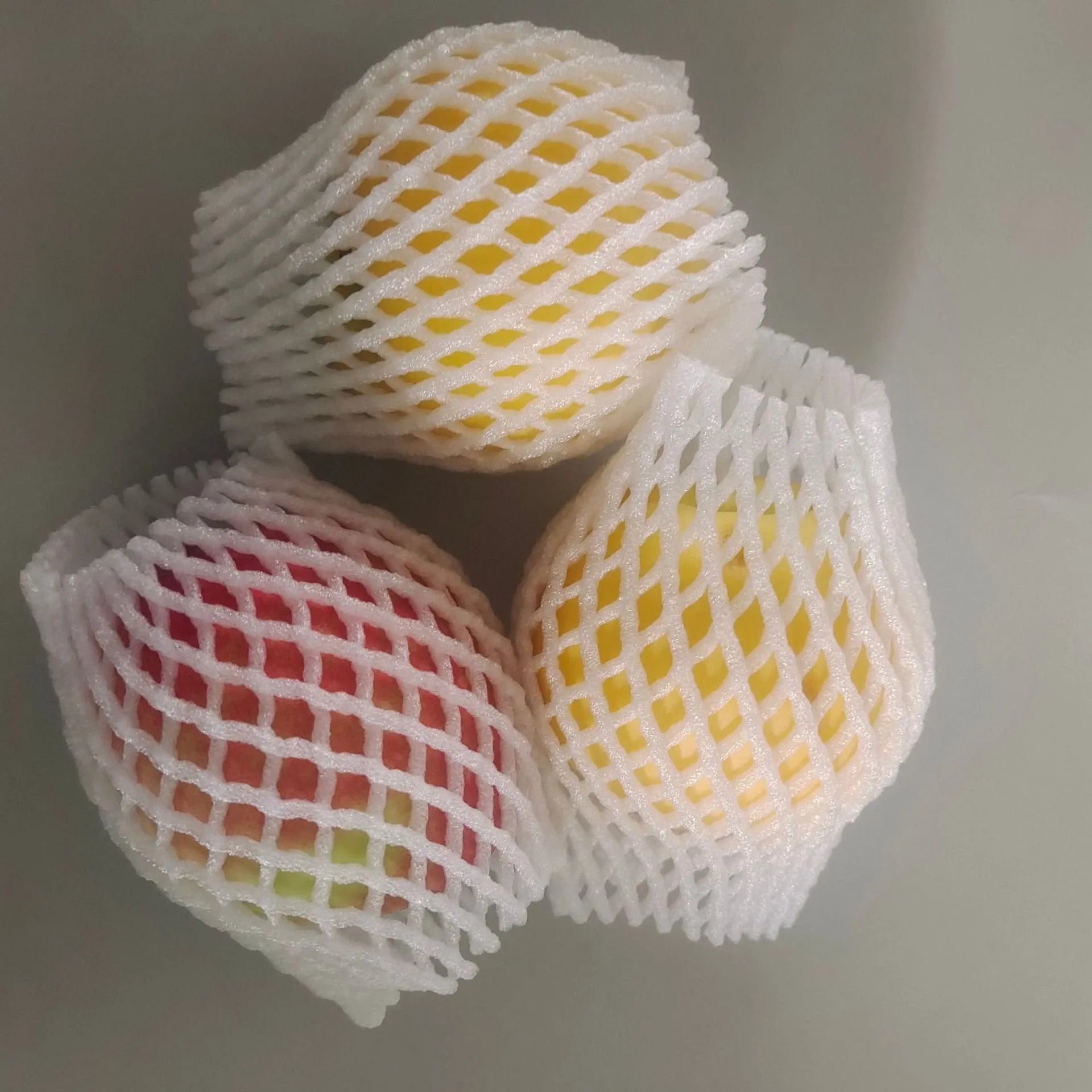 White foam protective net cover pack showing multiple size options for packaging protection