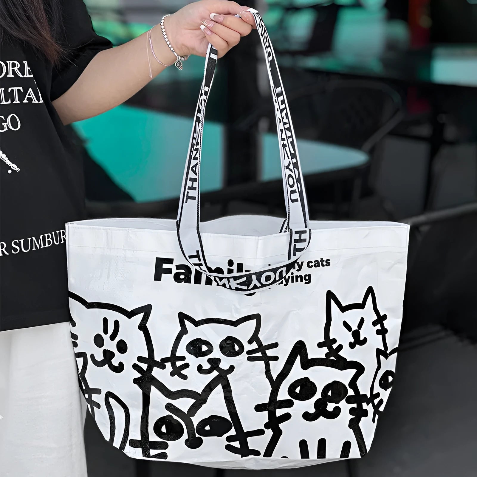 Green waterproof PP woven handbag with colour printing, style of a snakeskin bag.