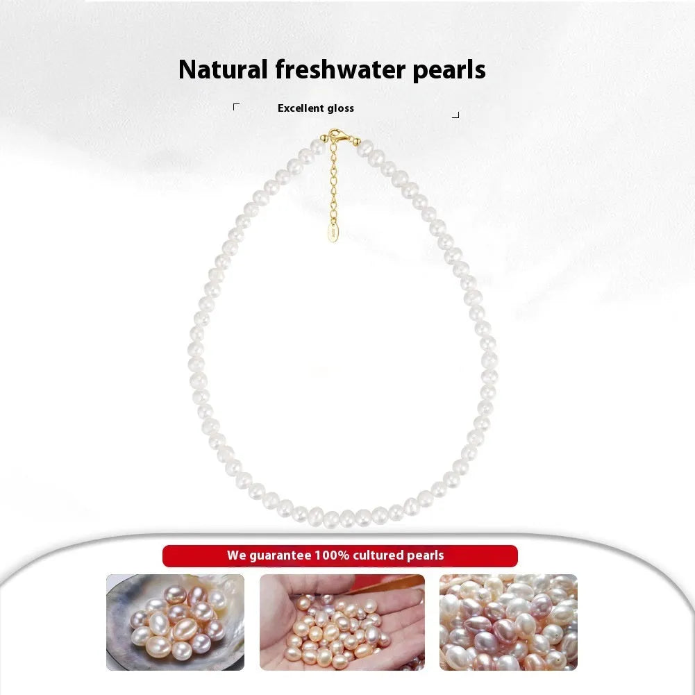 Women's adjustable necklace with natural freshwater pearls on a sterling silver chain.