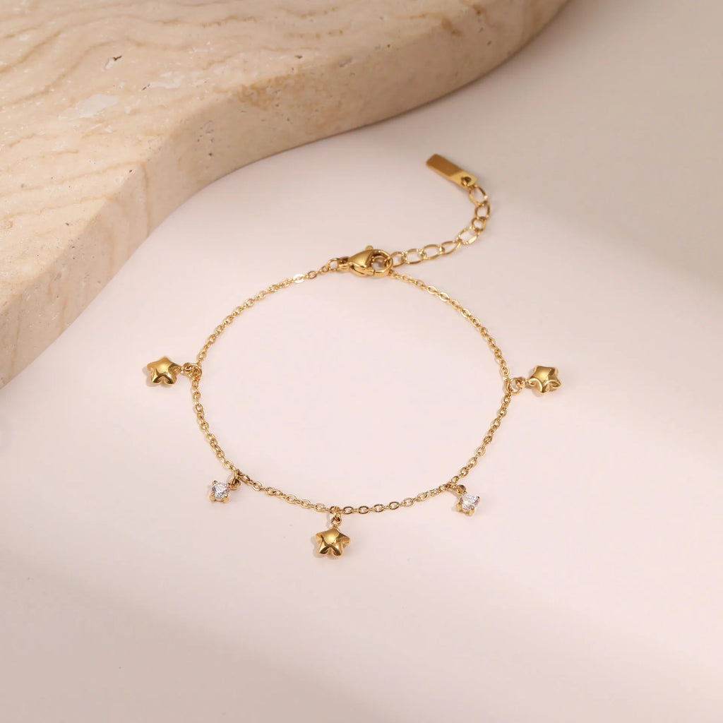 Women's gold-plated stainless steel bracelet with star-shaped zircon pendant