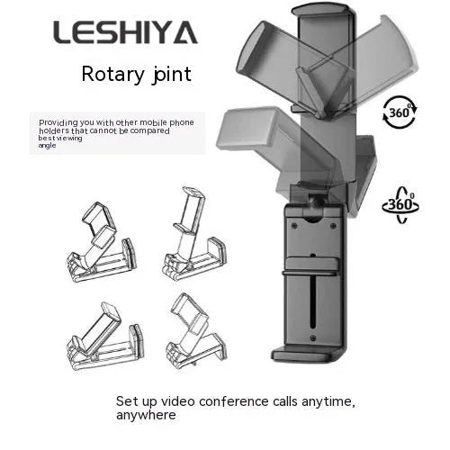 Black foldable rotating universal phone holder made of ABS plastic on a table.