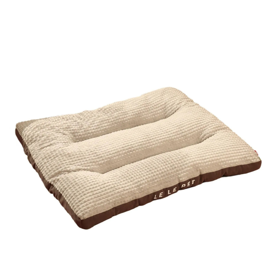 Soft fleece dog bed with a detachable blanket in green, shown in an XL size.