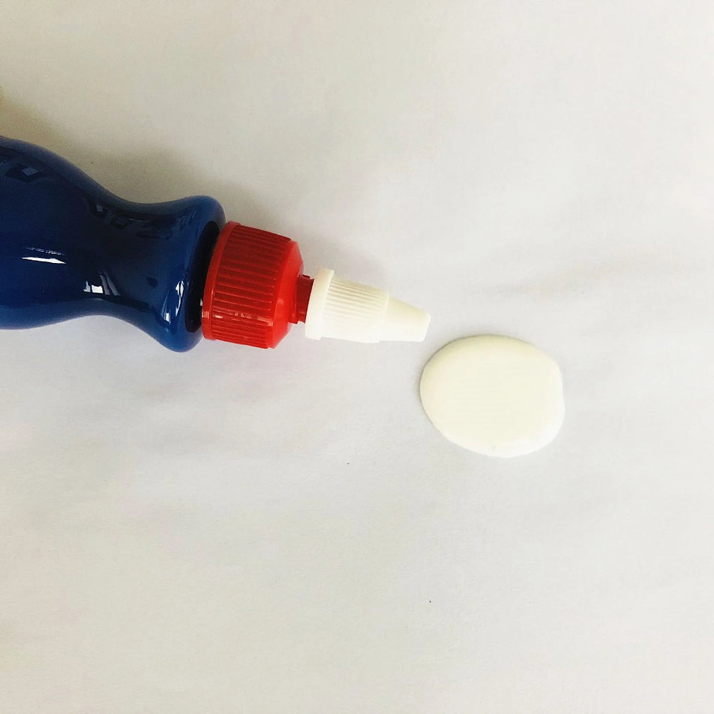 Small blue car wiping tool and scratch repair agent for automotive paint touch-ups