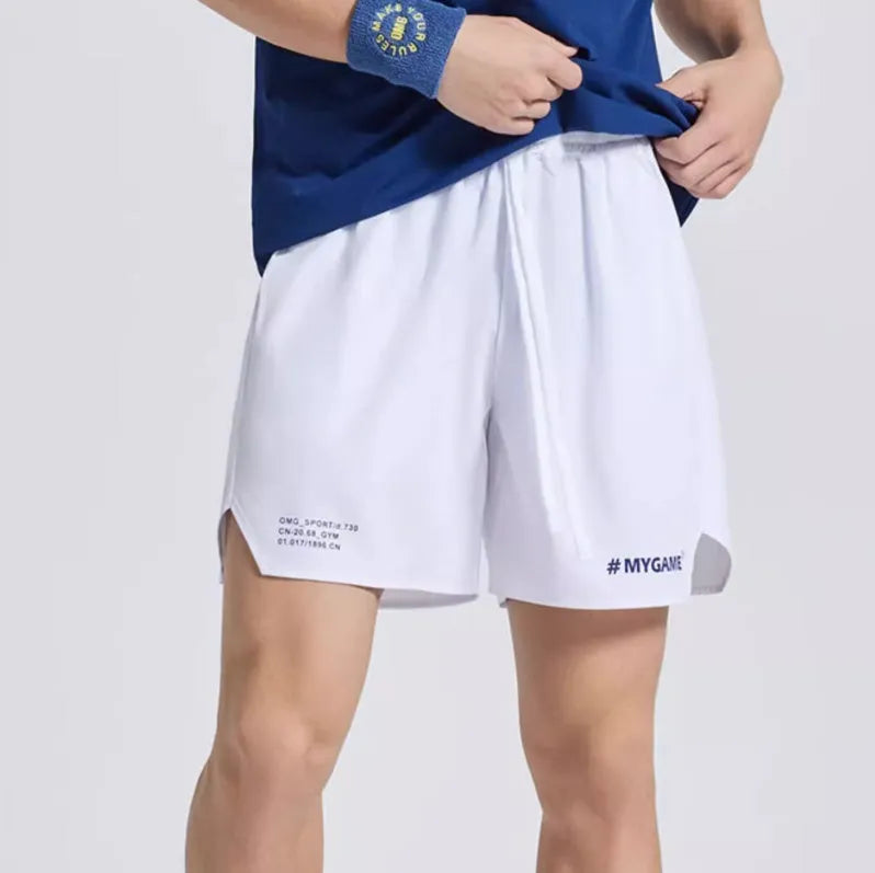 Men's navy blue training shorts with moisture-wicking fabric on a grey background.
