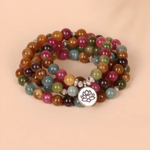 108 bead multi-layer bracelet with lotus hanging element in tourmaline colour