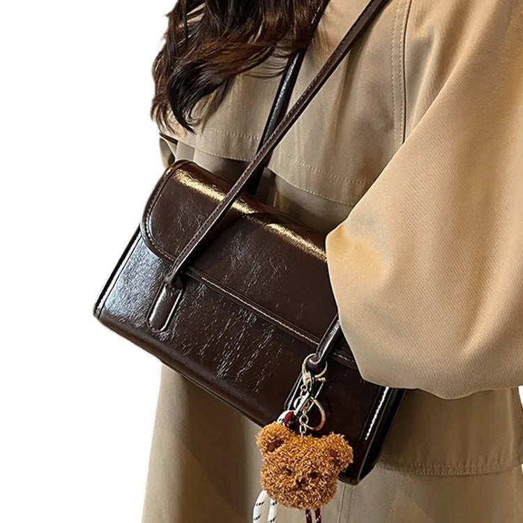 Brown women's horizontal square PU leather shoulder bag with pendant charm and double straps