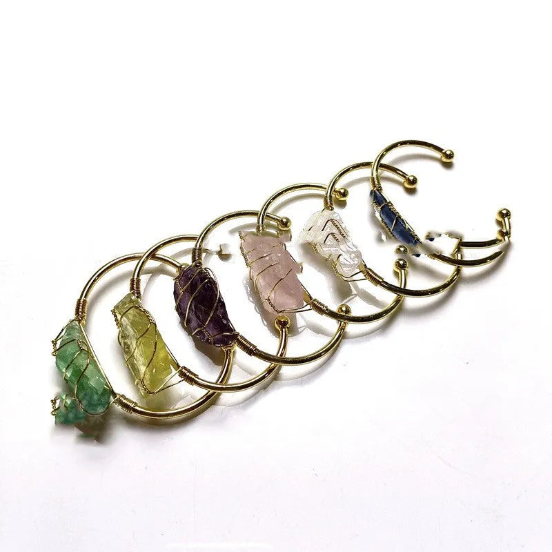 Gold winding geometric bracelet with natural crystal rough stones in bohemian ethnic design