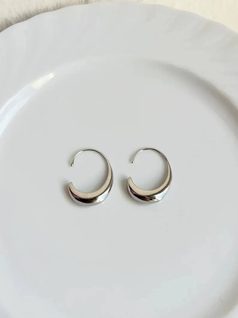 Gold and silver alloy earrings with snake design and electroplated finish