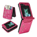 Samsung Galaxy Z Flip folding phone in a retro patchwork pattern case with visible card slots on the back.