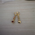 Heart-shaped women's earrings in gold or silver electroplated finish on alloy base