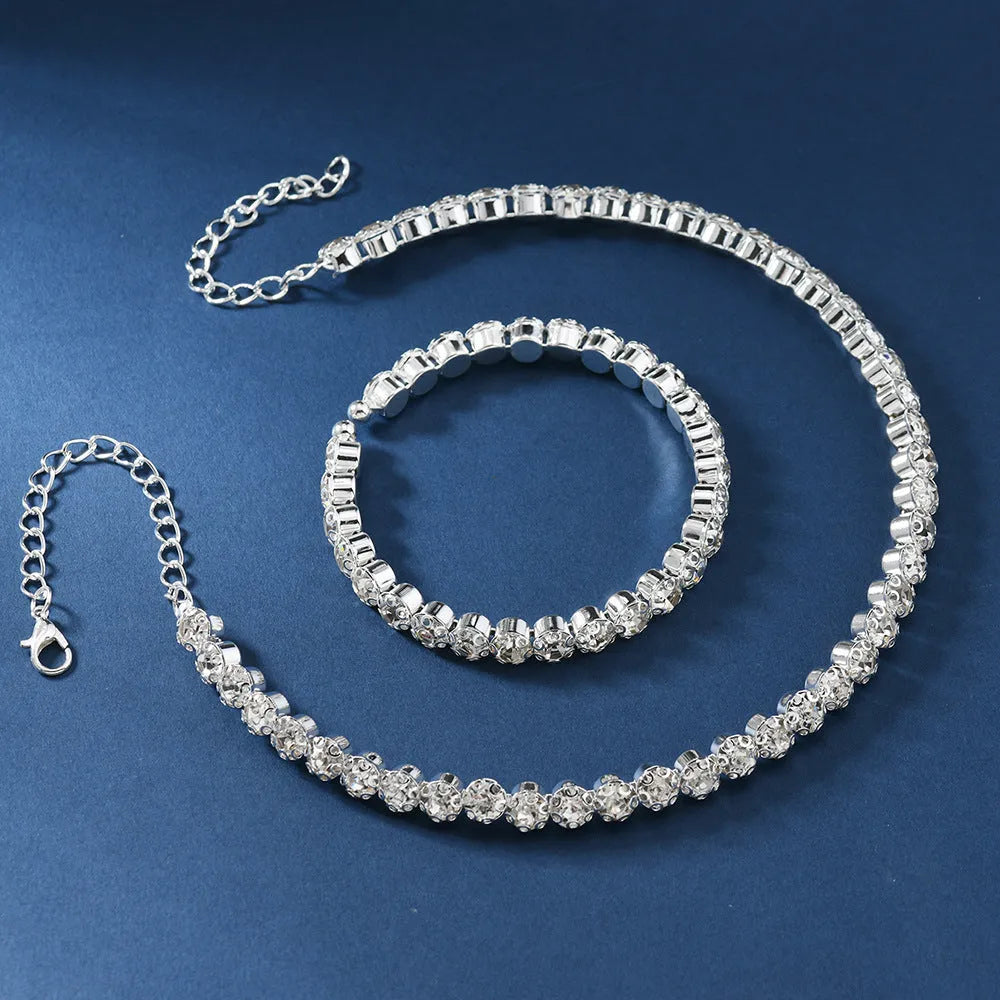 Women's rhinestone three-piece jewellery set with double-layer necklace, bracelet and ear studs in gold or silver