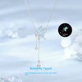 925 sterling silver butterfly tassel noctilucent necklace with O-ring chain on model, luminous pendant visible in low light