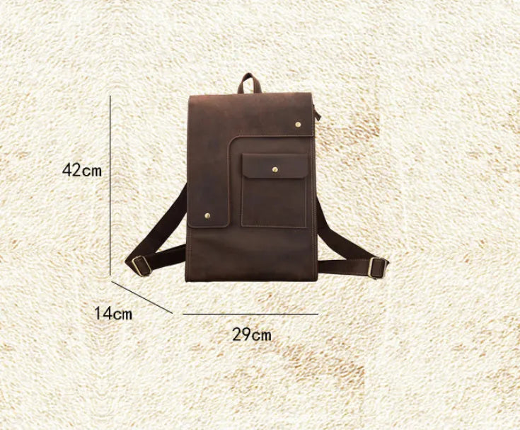 Dark brown genuine leather men's travel bag with shoulder straps and top handle.